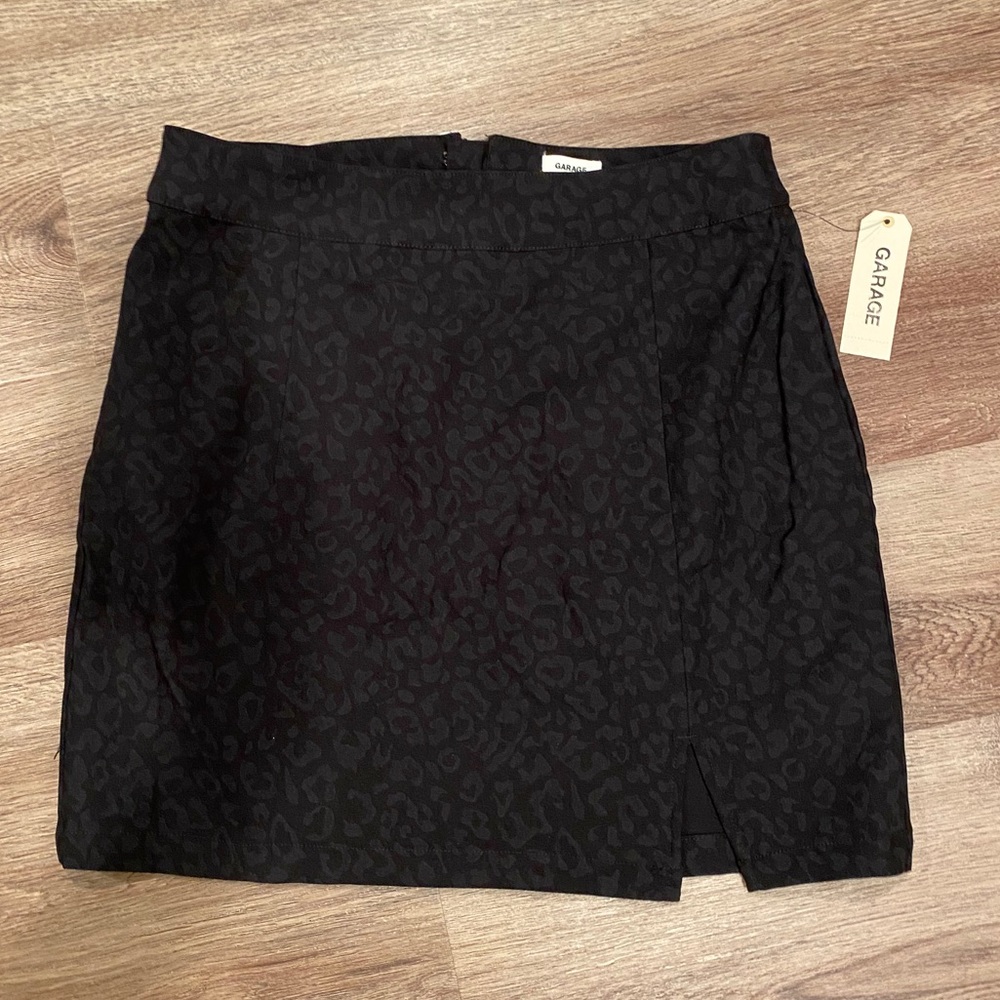 GARAGE **NEW** cheeta print black skirt